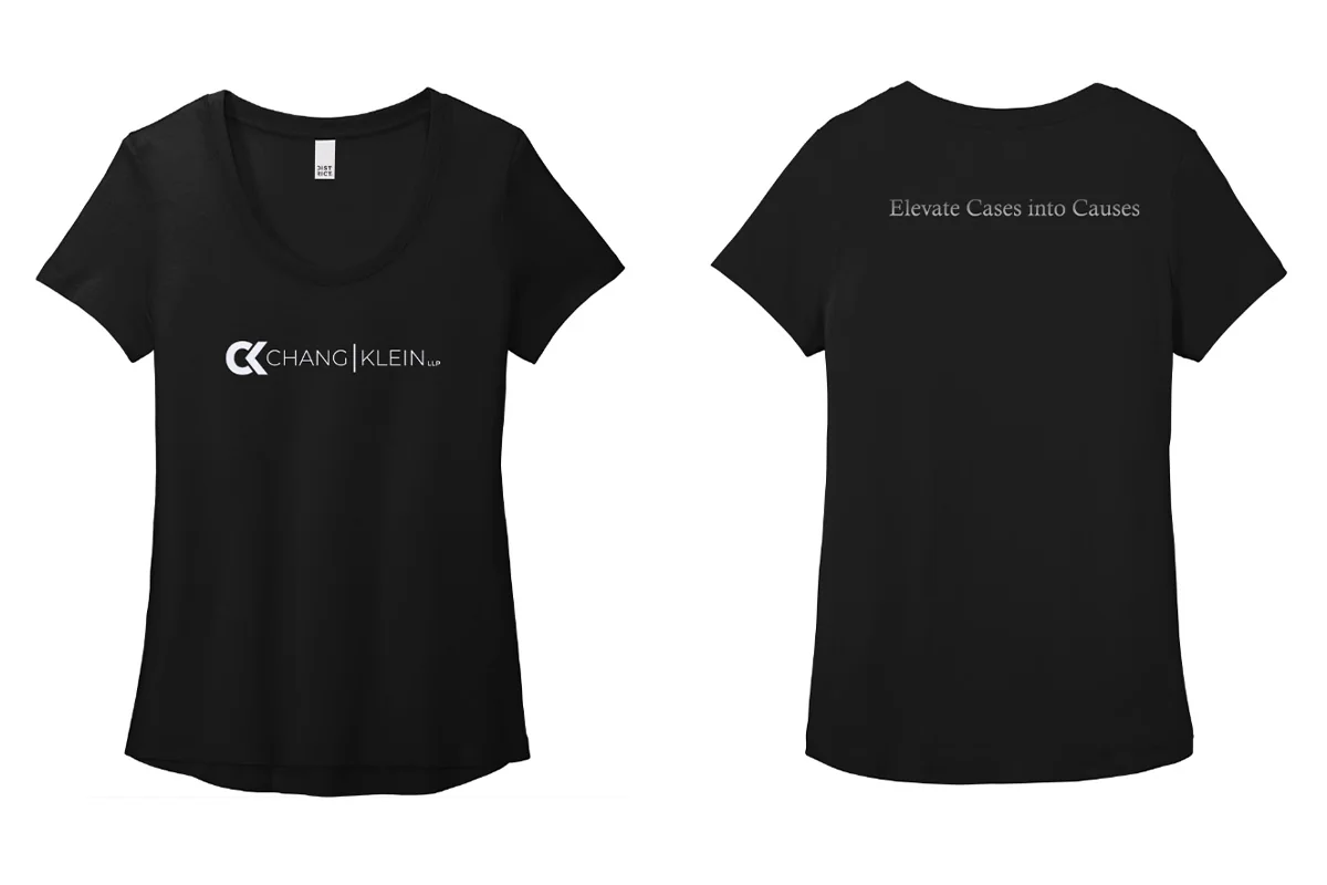 Black tee front with a Chang Klein wordmark and back with the tagline Elevate Cases into Causes.