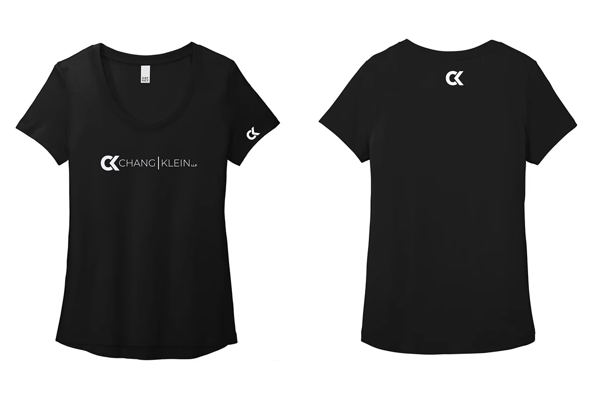 Black tee with a Chang Klein chest wordmark, a CK sleeve mark and a small CK monogram at the back neck.