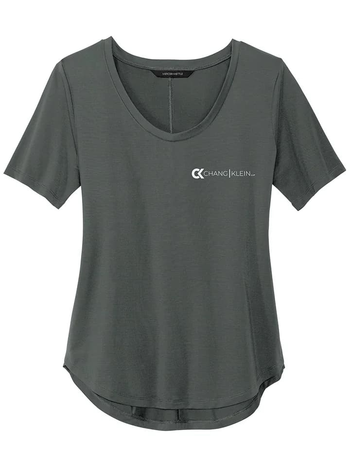 Green curved-hem tee with a horizontal white Chang Klein logo on the left chest.