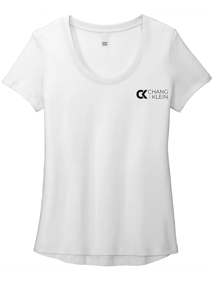 White tee with a compact Chang Klein logo and two-line wordmark on the left chest.