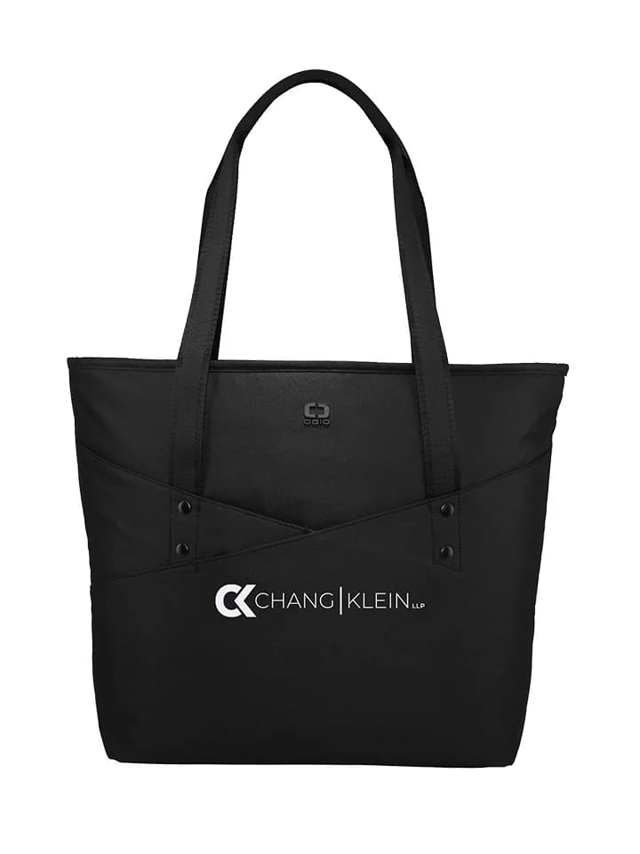 Black tote with angled front pockets and a horizontal white Chang Klein logo.