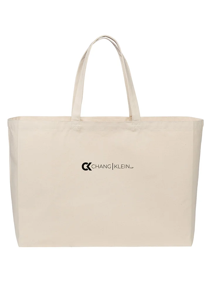Natural-colored tote with a horizontal black Chang Klein logo.