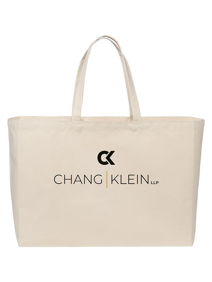 Natural-colored tote with a large stacked black Chang Klein logo and gold divider.